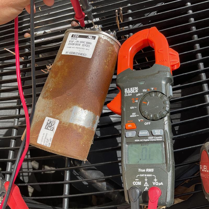 Compressor capacitor testing with digital clamp meter Compressor capacitor testing with digital clamp meter