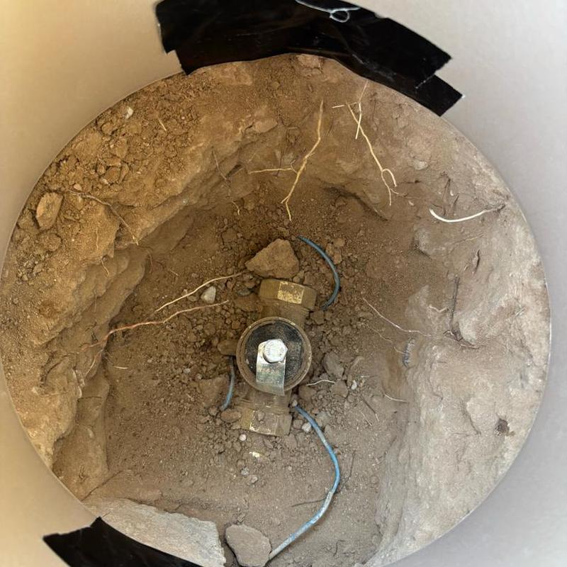 Pressure relief valve installed next to water meter box