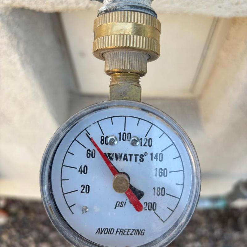 Pressure relief valve gauge showing 70 psi pressure setting