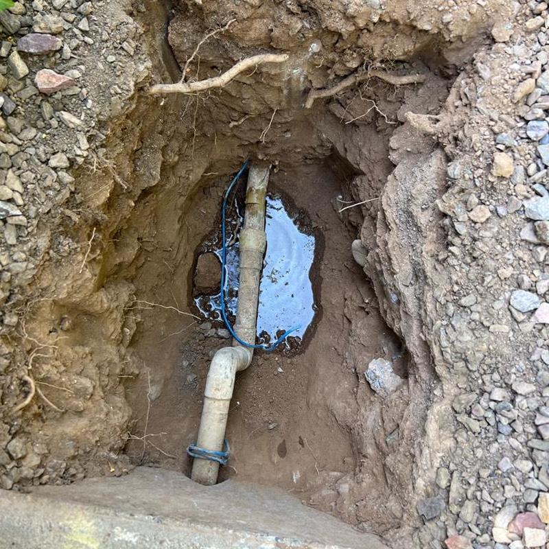 Main water line excavation with pressure valve installation