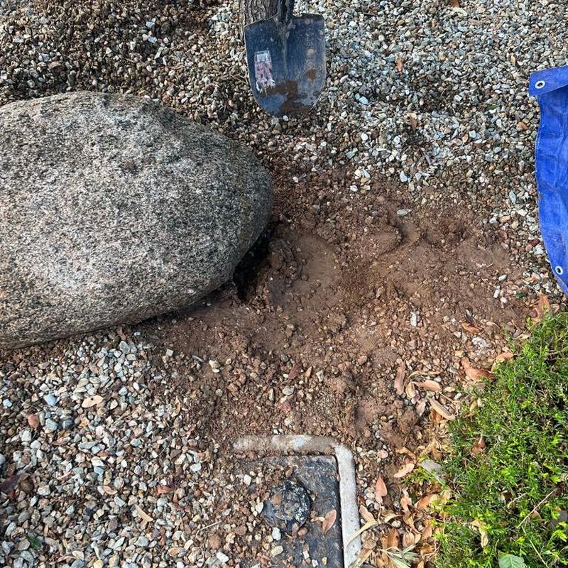Pressure Reducing Valve installation by water main with boulder