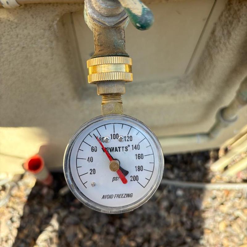Pressure gauge showing water pressure at 50 psi
