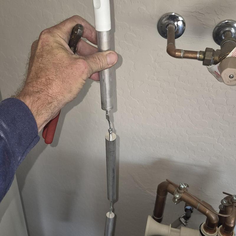 Anode rod replacement in water heater system