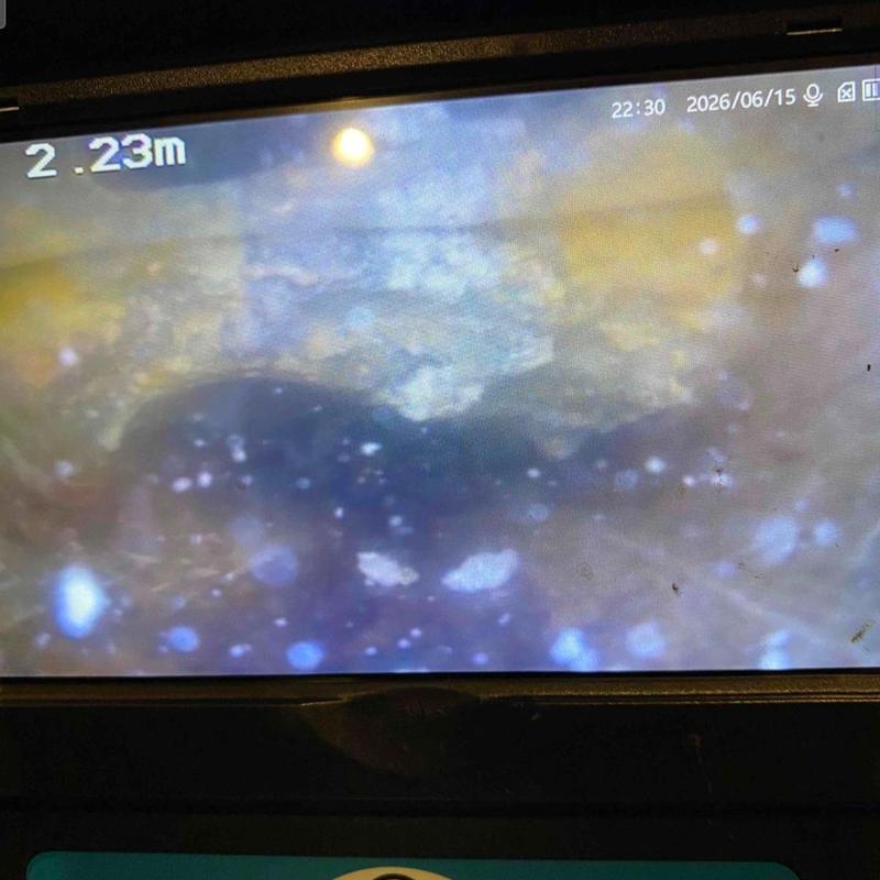 Drain pipe camera inspection showing blockage at 2.23m depth