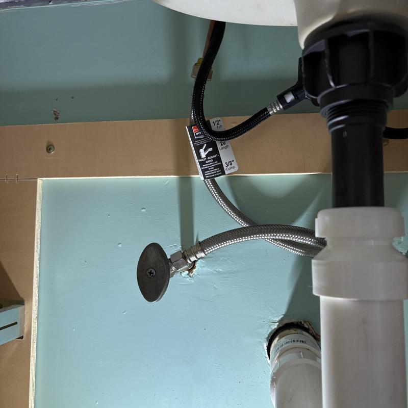 Bathroom faucet supply line and shut-off valve under sink