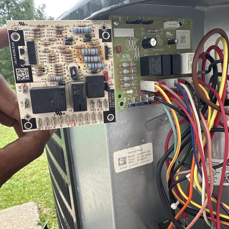 Control board with wiring inside HVAC unit outdoors Control board with wiring inside HVAC unit outdoors