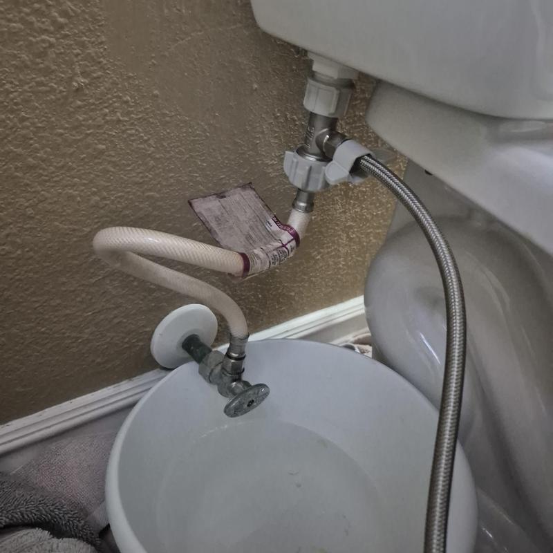 Toilet fill valve with quarter turn angle stop installed