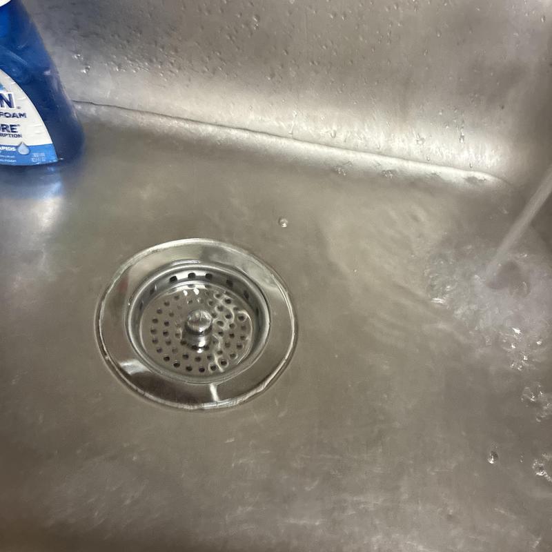 Kitchen sink drain with clear flowing water