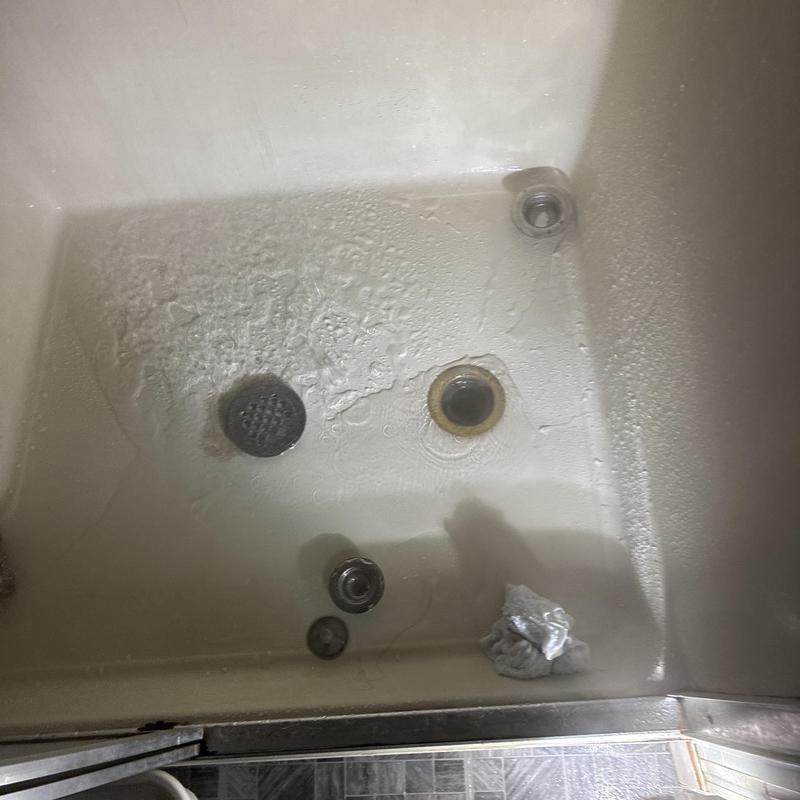 Shower drain and basin unclogging with water flowing