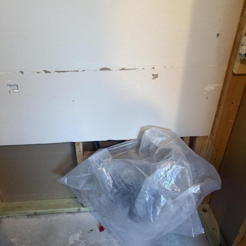 Copper bathroom repipe behind drywall with plastic cover