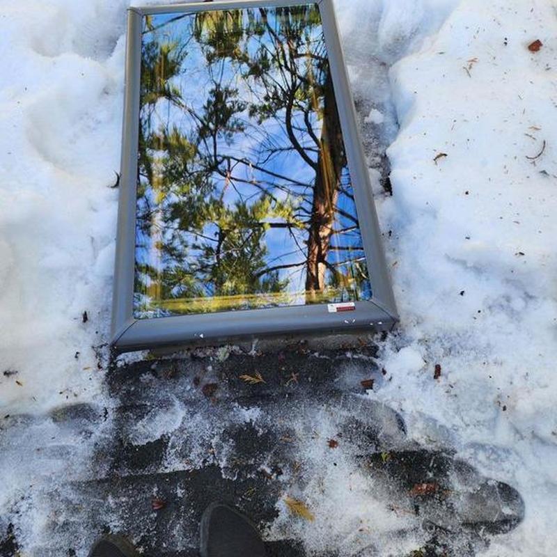 Deck mounted skylight replacement on snow-covered roof