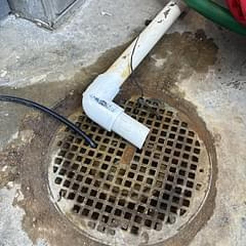 Condensate pipe centered over floor drain in basement Condensate pipe centered over floor drain in basement