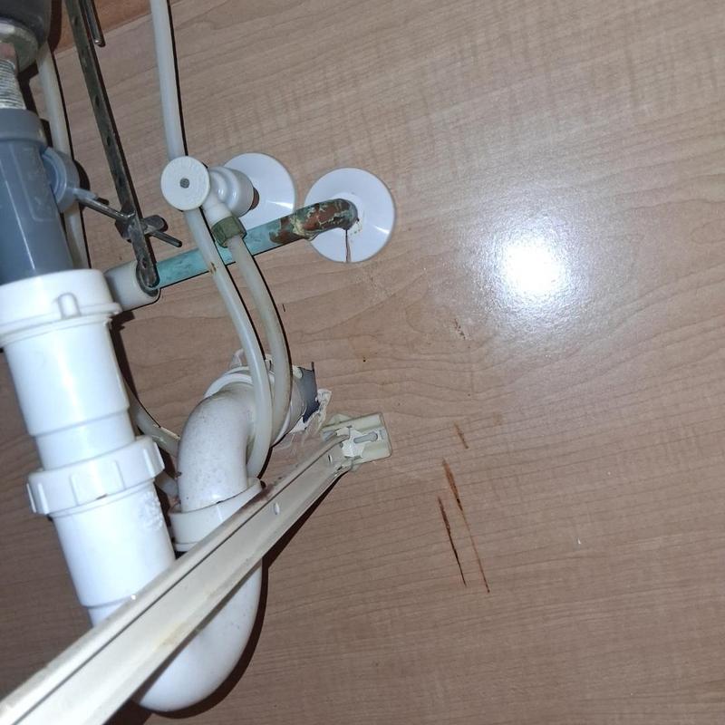 Kitchen sink drain trap and water supply lines installation