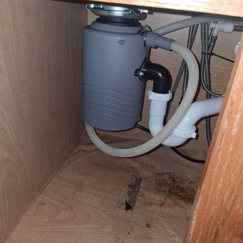 Kitchen sink disposal replacement and plumbing rebuilt