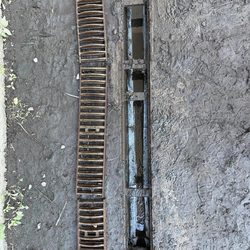Loading dock drain with rusted metal grate removed Loading dock drain with rusted metal grate removed