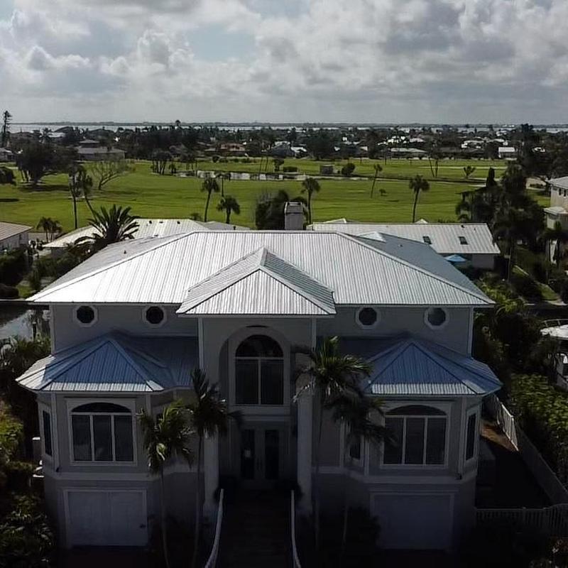 Standing seam metal roof on coastal residential home Standing seam metal roof on coastal residential home