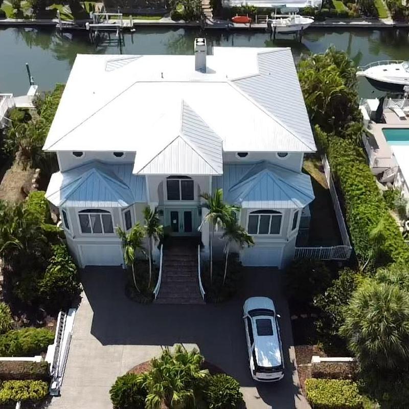 Standing seam metal roof on waterfront home Standing seam metal roof on waterfront home