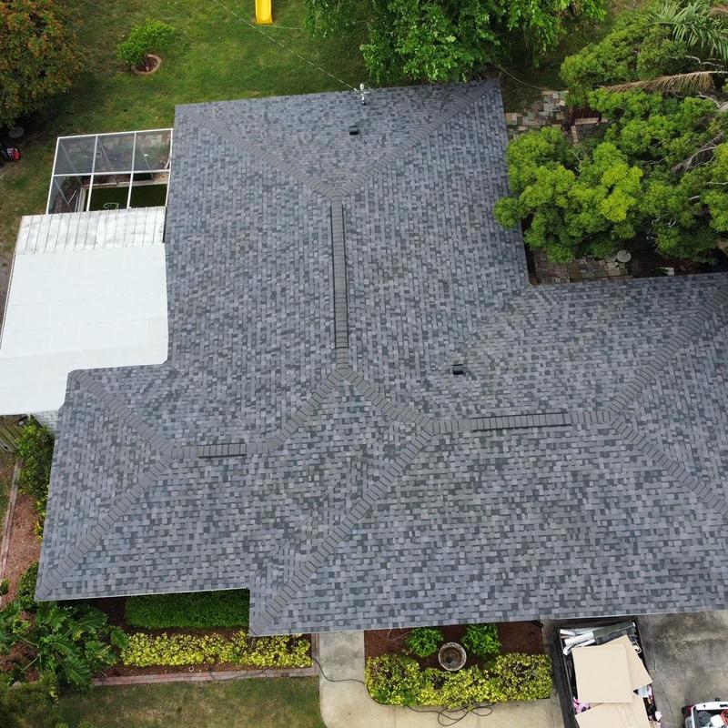 Residential Owens Corning shingle roof with tapered insulation Residential Owens Corning shingle roof with tapered insulation
