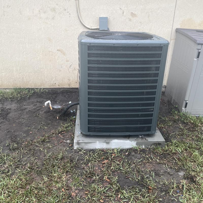 5-ton HVAC condenser unit on concrete pad outdoors
