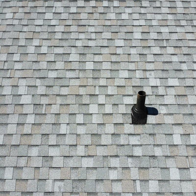 Tamko Titan XT impact resistant roof shingles with vent pipe