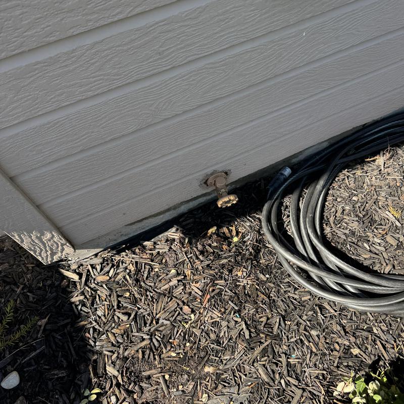Hose bib with new service loop installation outdoors Hose bib with new service loop installation outdoors