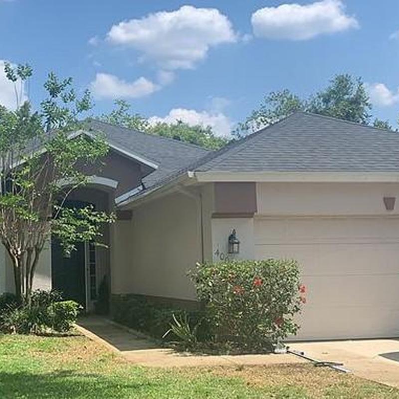 Architectural shingle roof on residential house Architectural shingle roof on residential house