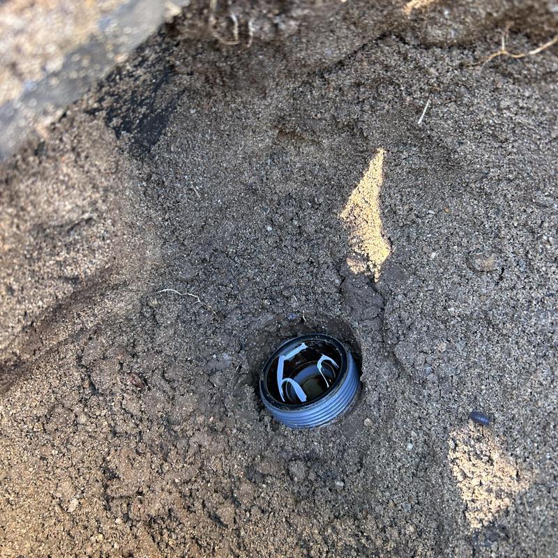 Sprinkler valve box excavation showing internal components