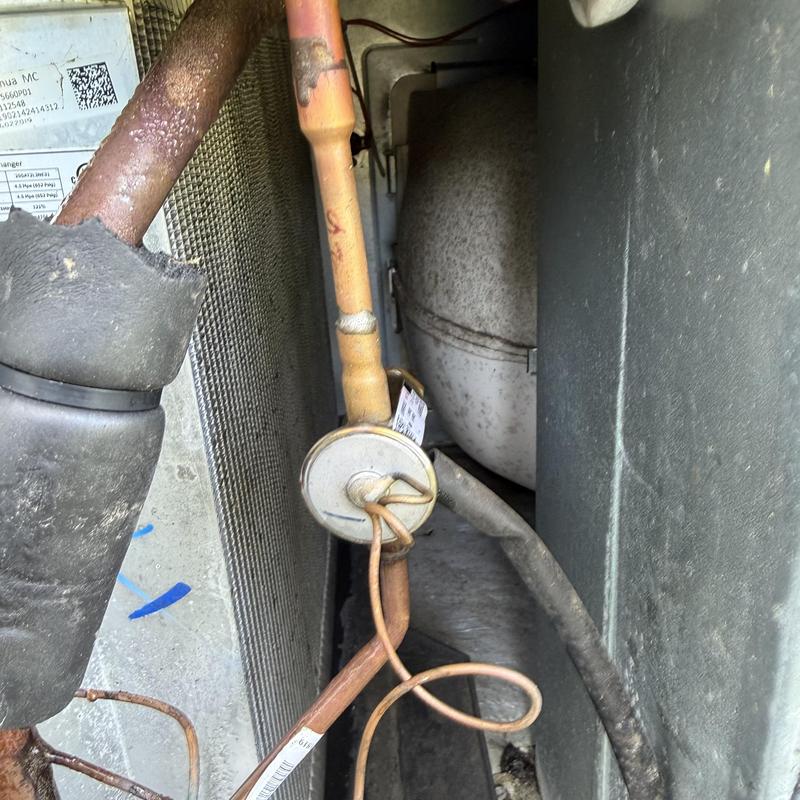 TXV valve and copper tubing in HVAC unit close-up TXV valve and copper tubing in HVAC unit close-up