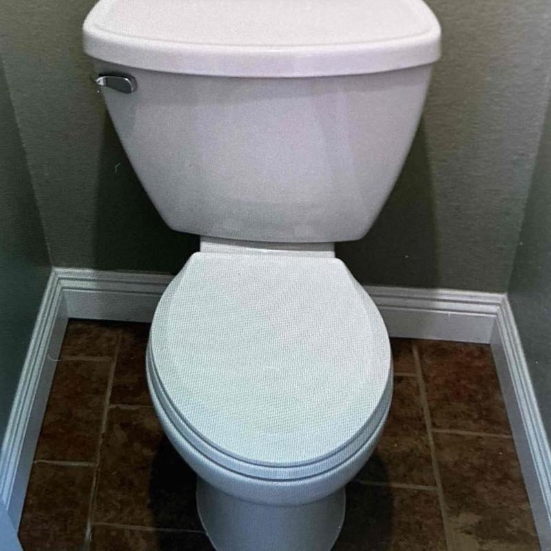Toilet installation with new wax ring and supply line