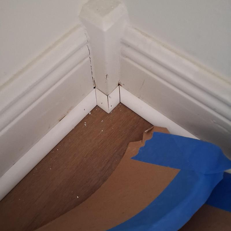 Quarter round molding installation over hardwood flooring corner