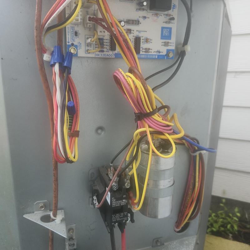 AC capacitor and compressor wiring repairs in unit panel