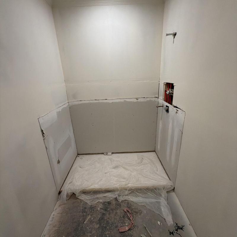 Sheetrock panels bathroom repair in progress Florence MS