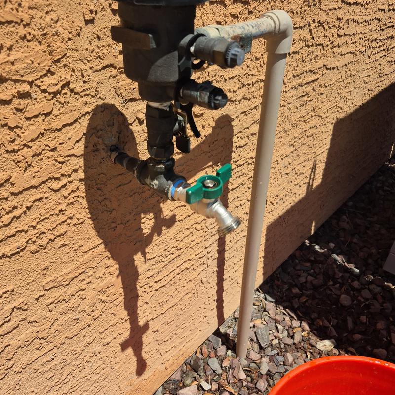 Pressure regulator valve and hose bib with green handle