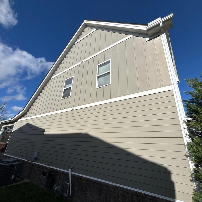 House exterior siding and trim under daylight sky