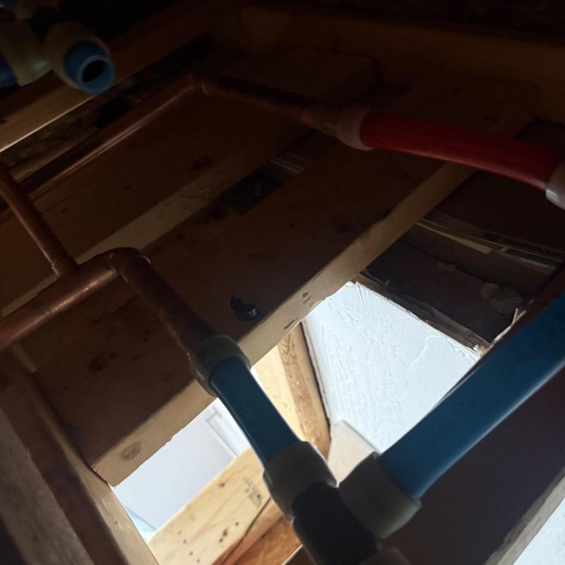 Copper bathroom repipe with PEX tubing connections