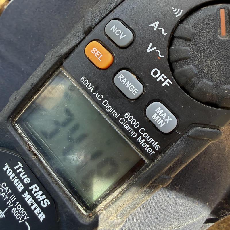 Digital clamp meter showing HVAC system reading Digital clamp meter showing HVAC system reading