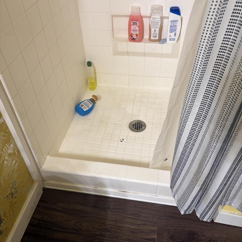 Shower drain with cleaning products and curtain Shower drain with cleaning products and curtain