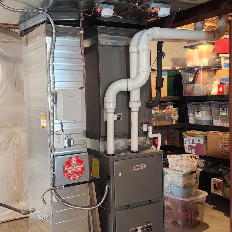 Furnace and ductwork installation in basement storage area Furnace and ductwork installation in basement storage area