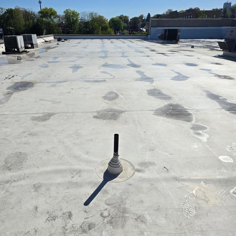 TPO roof membrane with plumbing vent and HVAC units TPO roof membrane with plumbing vent and HVAC units