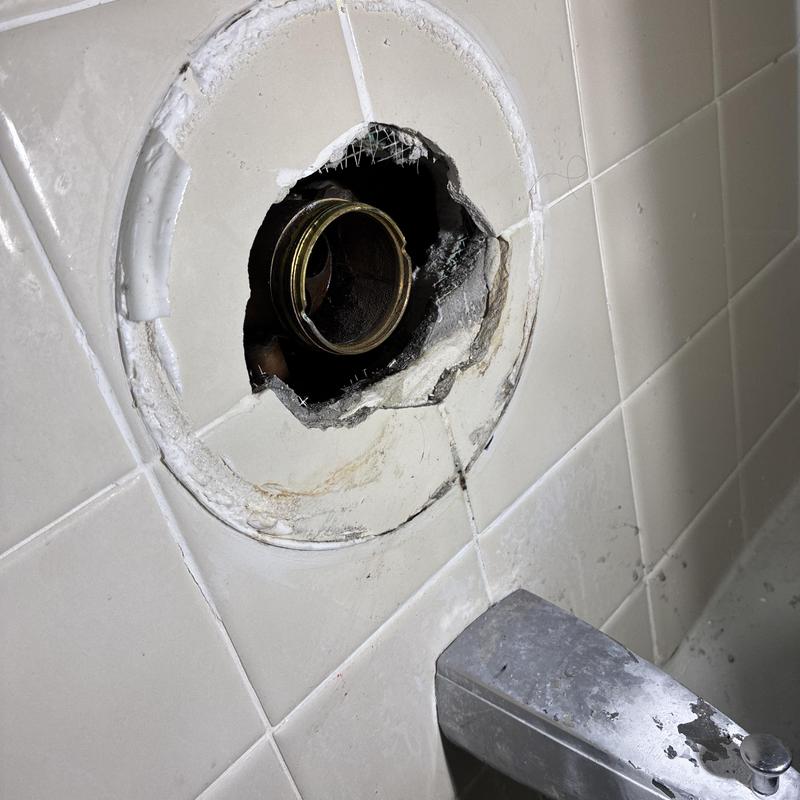 Delta shower faucet valve with damaged wall tile opening