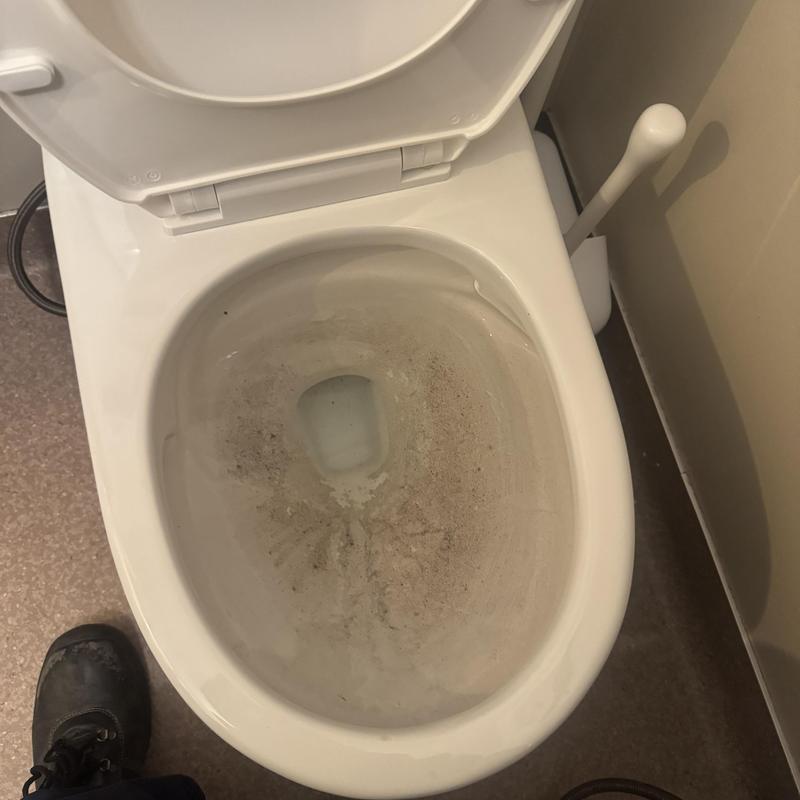 Toilet bowl with mineral buildup and staining