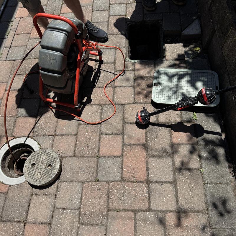 Sewer line hydro jetting equipment and open access pit