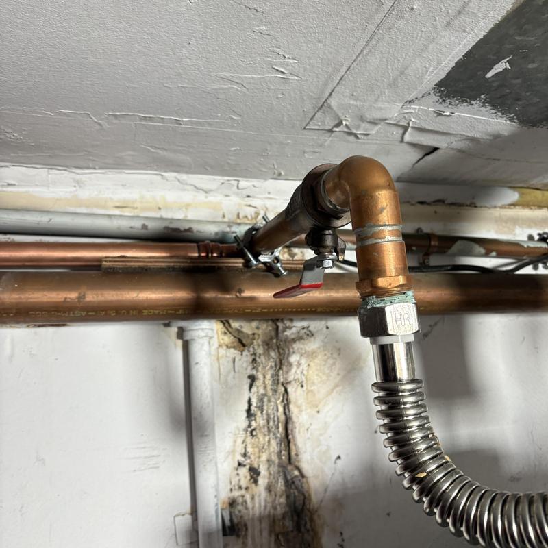 Copper water line with shut-off valve in garage