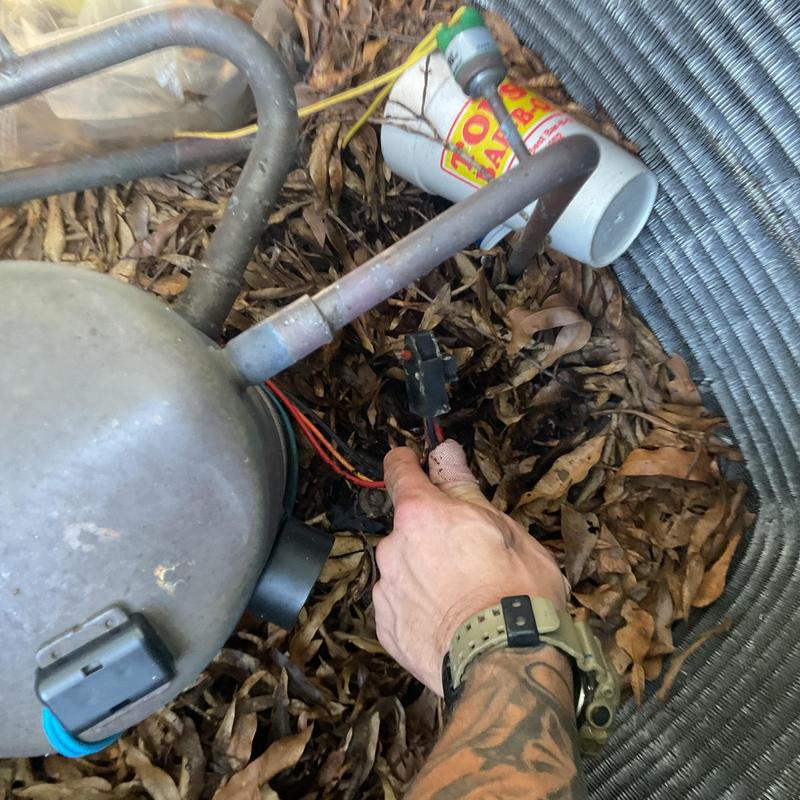 AC compressor with wiring and condenser coil outdoors AC compressor with wiring and condenser coil outdoors