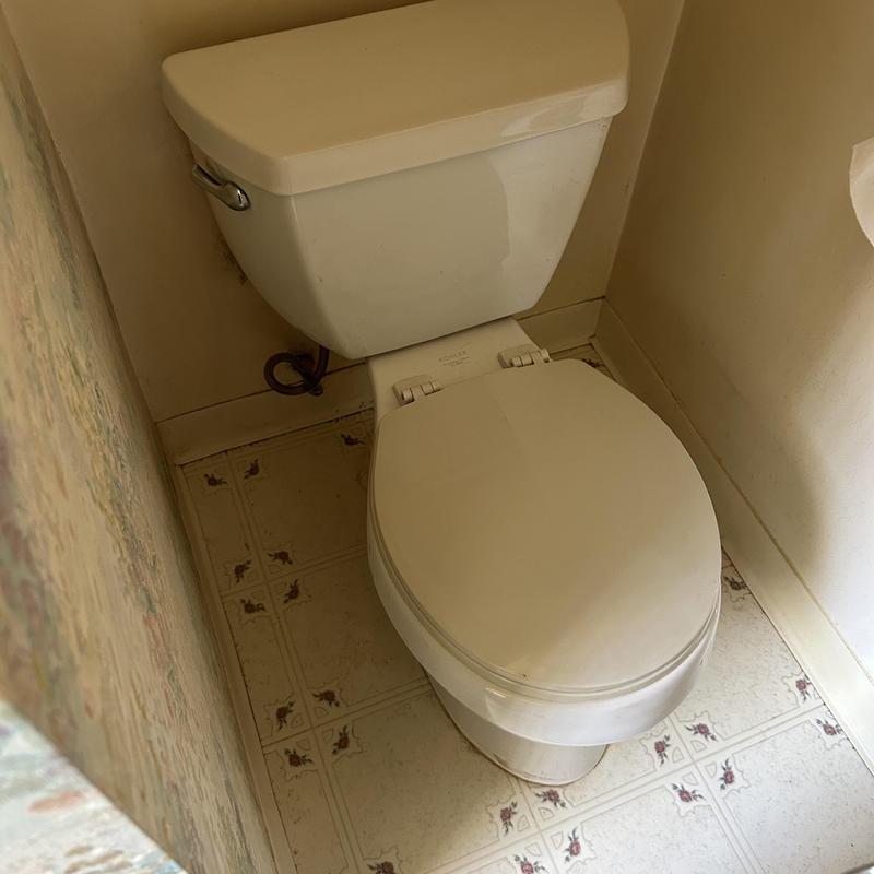 Toilet installation in small bathroom corner Toilet installation in small bathroom corner