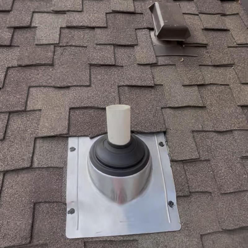 Pipe boot flashing on CertainTeed Presidential roof shingles Pipe boot flashing on CertainTeed Presidential roof shingles