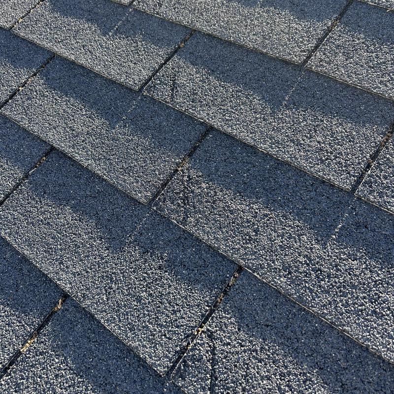 3 tab shingles showing wear on roof surface 3 tab shingles showing wear on roof surface