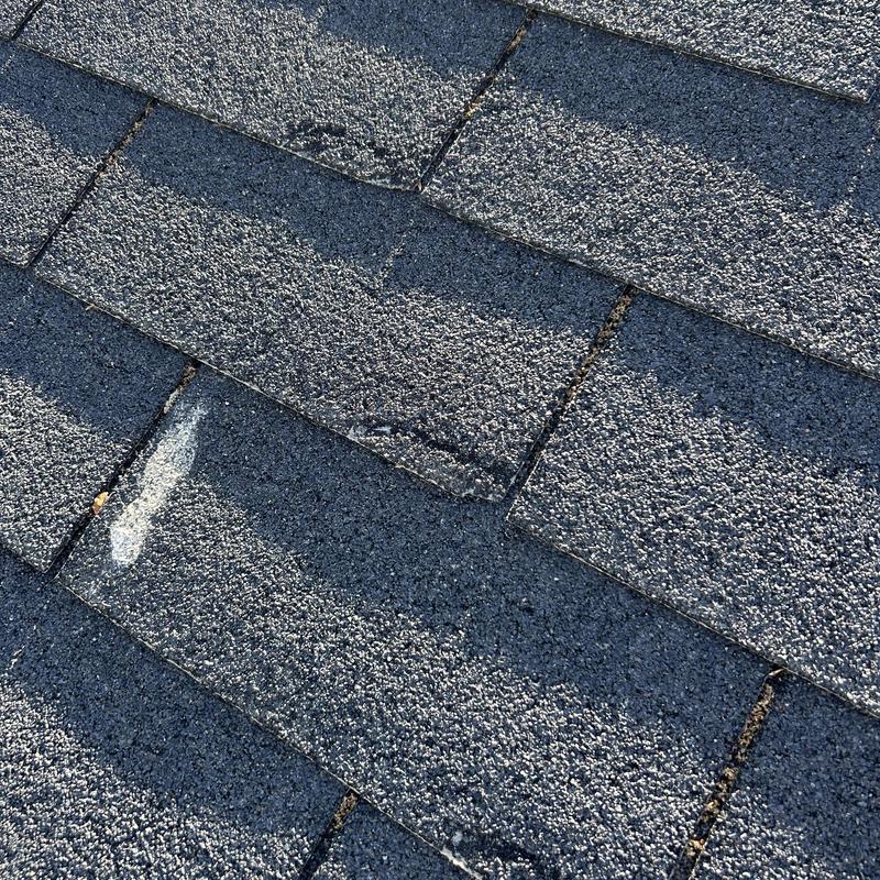 3-tab asphalt shingles with granule loss and wear 3-tab asphalt shingles with granule loss and wear