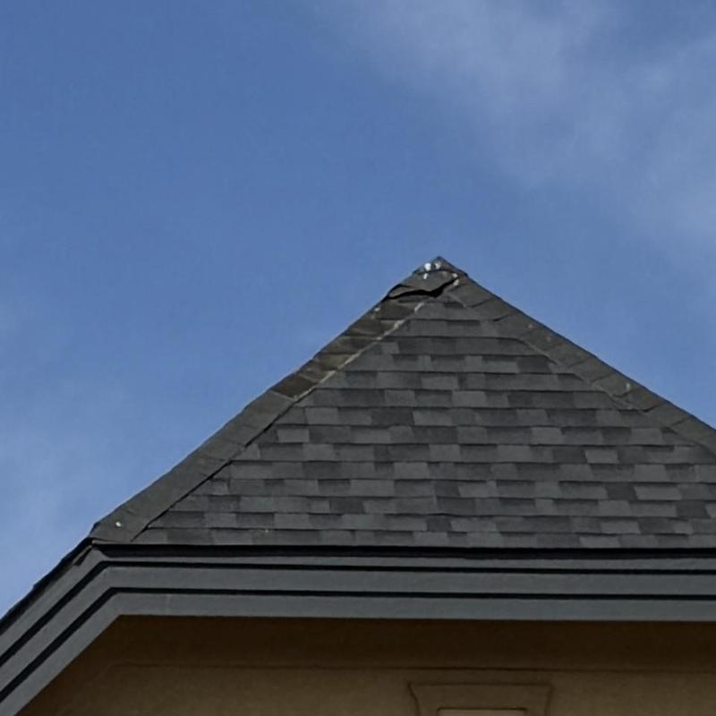 Malarkey ridge shingles on steep roof peak Malarkey ridge shingles on steep roof peak