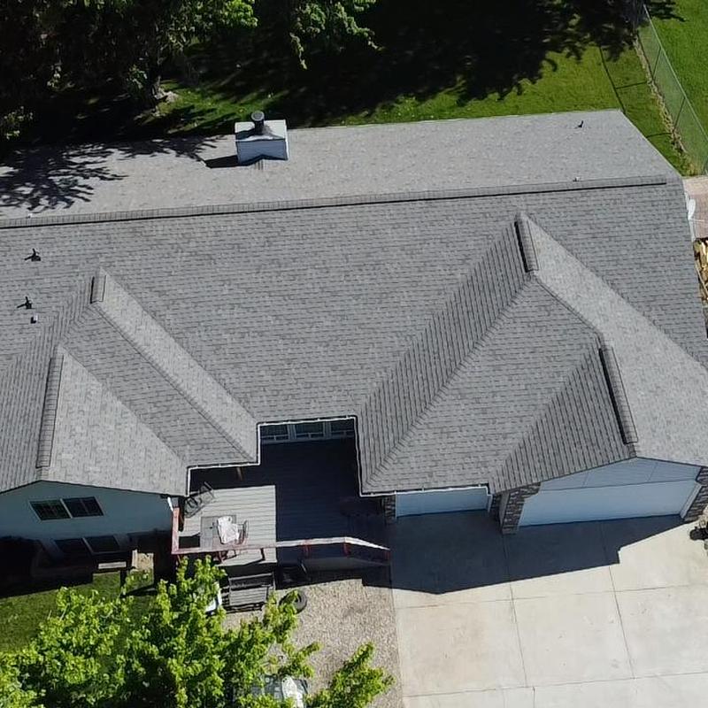 Weathered wood shingle roof with vented ridge system Weathered wood shingle roof with vented ridge system